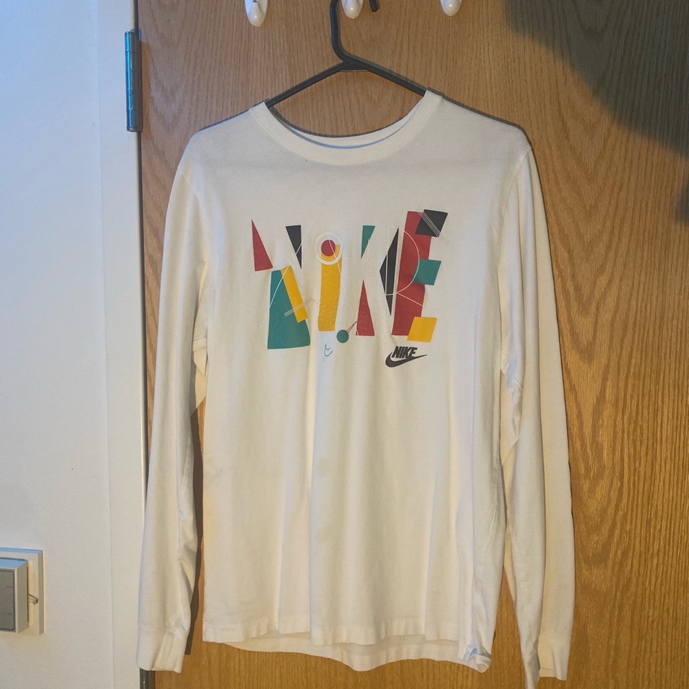 Nike longsleeve white w/ multicolored textured print.